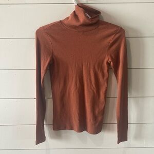 BP. Rust colored turtle neck.